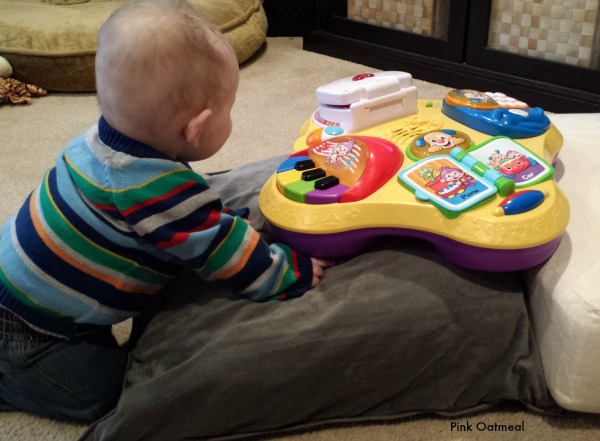 helping baby pull to stand