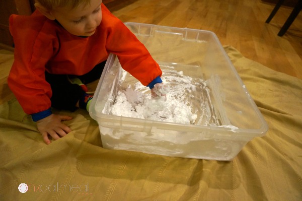 DIY Snow that is perfect for indoor sensory play.  I love how the DIY snow even feels cold when made.  Super fun sensory play experience!