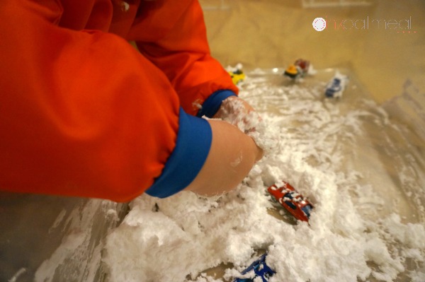 DIY Snow that is perfect for indoor sensory play.  I love how the DIY snow even feels cold when made.  Super fun sensory play experience!