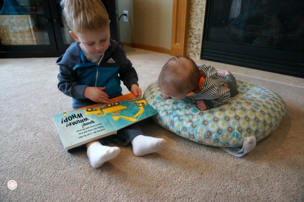 Incorporating Your Toddler In Tummy Time.  This is a great tip for tummy time.  I have trouble coming up with activities for a toddler when my baby is doing tummy time! - Pink Oatmeal