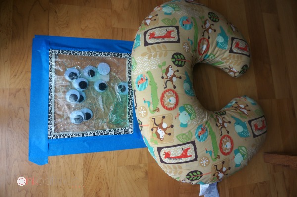 Tummy time sensory bag play! Such a fun baby play idea!