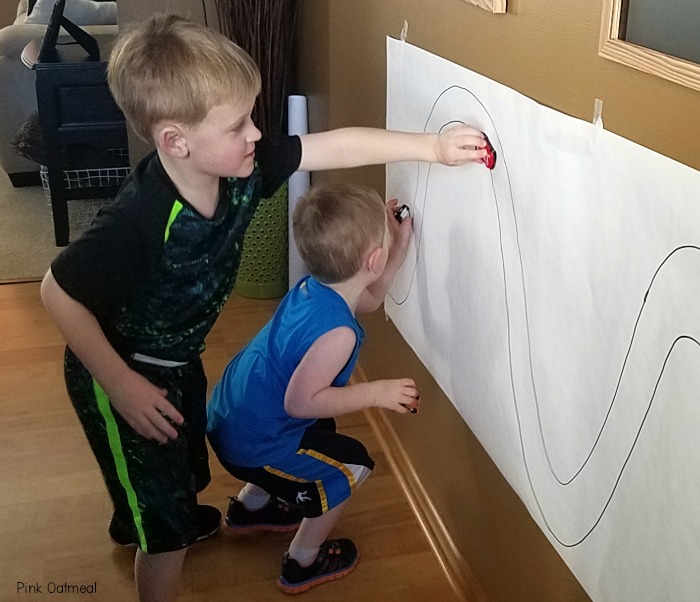 Combining Gross Motor and Fine Motor Skills by working on a Vertical Surface