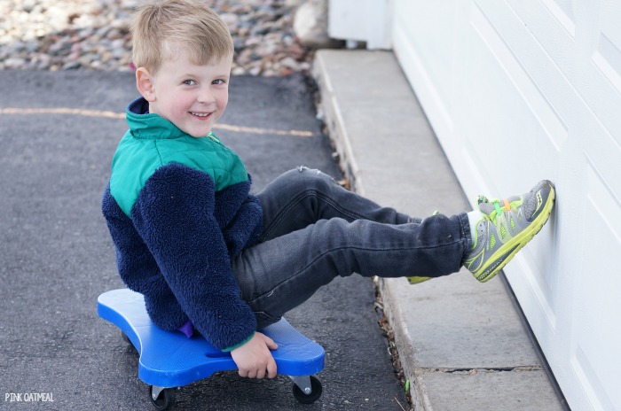 Using a scooter board is the perfect way to work on the skill of jumping! A great jumping practice idea! 