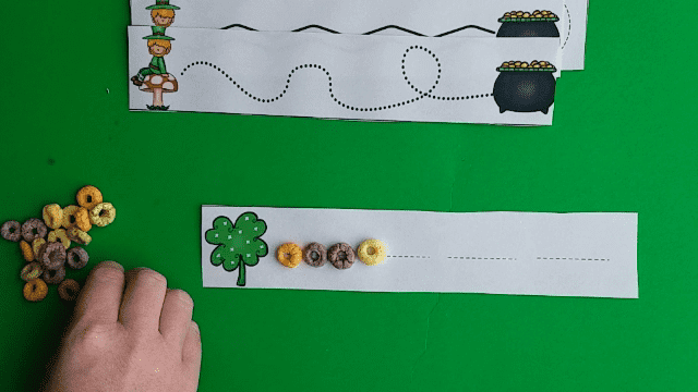 St. Patrick's Day fine motor activites. Fun St. Patrick's Day themed activities including cutting, tracing, manipulatives, clips, and more! Great for occupaitonal therapy, pre-k and kindergarten fine motor activities! 
